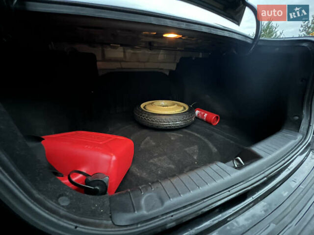 Черный Хендай Аванте, объемом двигателя 1.6 л и пробегом 154 тыс. км за 6000 $, фото 57 на Automoto.ua