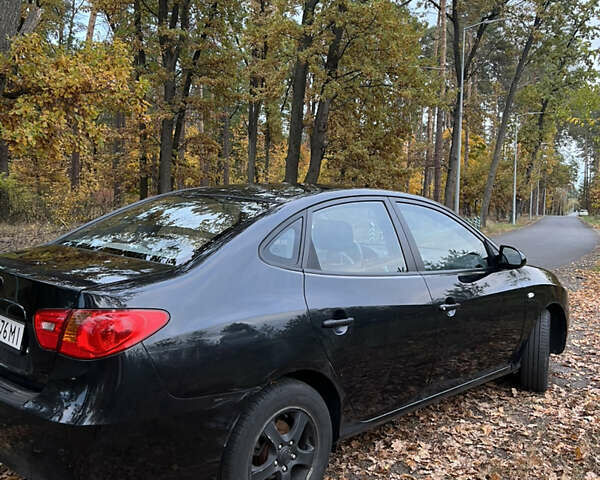 Черный Хендай Аванте, объемом двигателя 1.6 л и пробегом 154 тыс. км за 6000 $, фото 4 на Automoto.ua