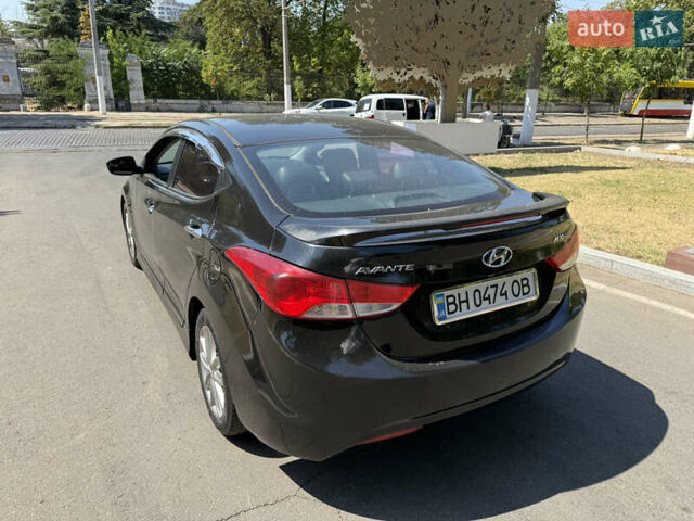Черный Хендай Аванте, объемом двигателя 1.6 л и пробегом 198 тыс. км за 8500 $, фото 6 на Automoto.ua