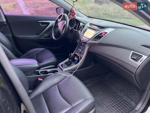 Черный Хендай Аванте, объемом двигателя 1.6 л и пробегом 138 тыс. км за 10900 $, фото 10 на Automoto.ua