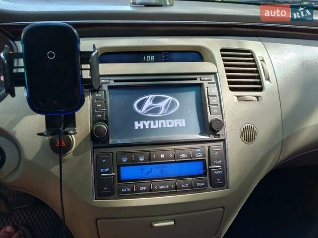 Белый Хендай Азера, объемом двигателя 2.7 л и пробегом 208 тыс. км за 6300 $, фото 13 на Automoto.ua