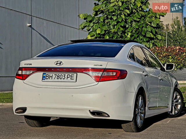 Белый Хендай Азера, объемом двигателя 3 л и пробегом 167 тыс. км за 9900 $, фото 13 на Automoto.ua