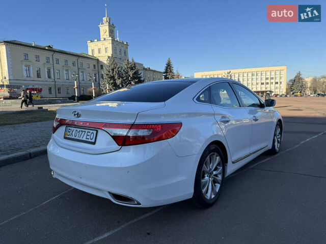 Белый Хендай Азера, объемом двигателя 3 л и пробегом 178 тыс. км за 9899 $, фото 23 на Automoto.ua