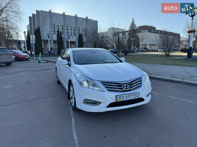 Белый Хендай Азера, объемом двигателя 3 л и пробегом 178 тыс. км за 9899 $, фото 20 на Automoto.ua
