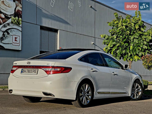 Белый Хендай Азера, объемом двигателя 3 л и пробегом 167 тыс. км за 9900 $, фото 14 на Automoto.ua