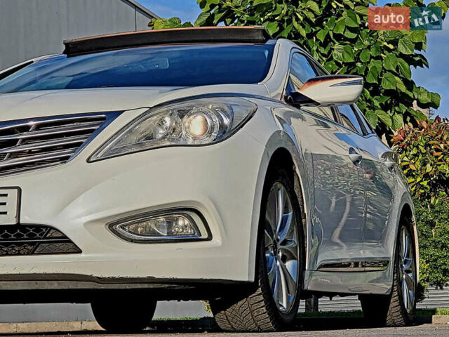 Белый Хендай Азера, объемом двигателя 3 л и пробегом 167 тыс. км за 9900 $, фото 5 на Automoto.ua