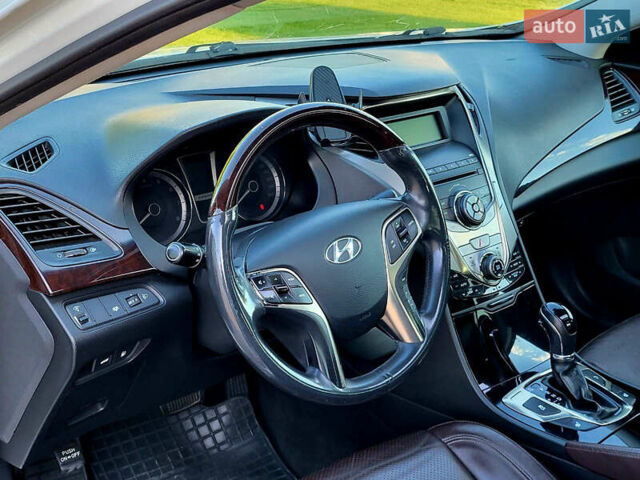 Белый Хендай Азера, объемом двигателя 3 л и пробегом 167 тыс. км за 9900 $, фото 21 на Automoto.ua