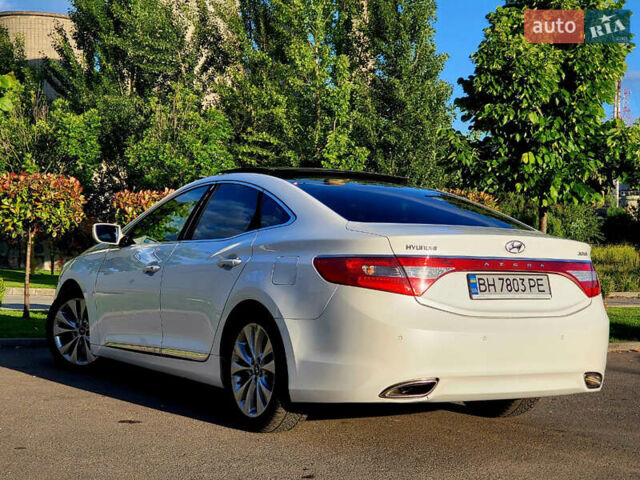 Белый Хендай Азера, объемом двигателя 3 л и пробегом 167 тыс. км за 9900 $, фото 7 на Automoto.ua