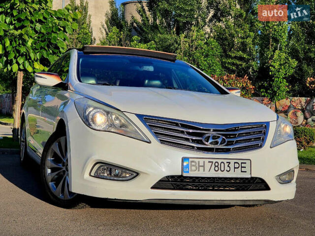 Белый Хендай Азера, объемом двигателя 3 л и пробегом 167 тыс. км за 9900 $, фото 1 на Automoto.ua