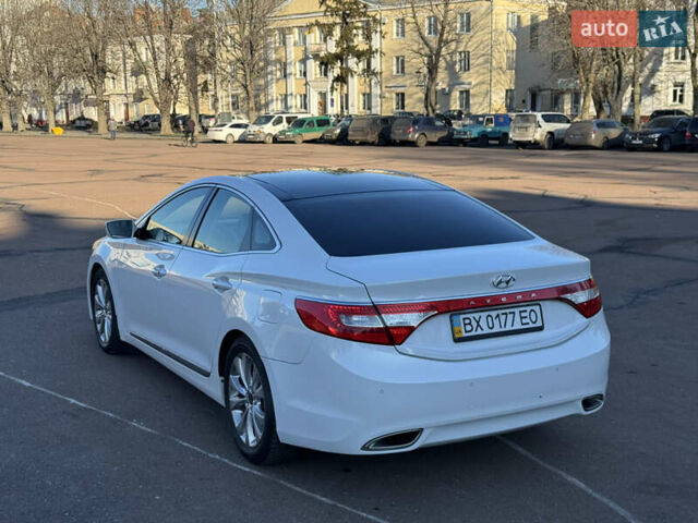 Белый Хендай Азера, объемом двигателя 3 л и пробегом 178 тыс. км за 9899 $, фото 18 на Automoto.ua