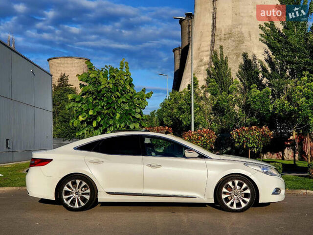 Белый Хендай Азера, объемом двигателя 3 л и пробегом 167 тыс. км за 9900 $, фото 15 на Automoto.ua