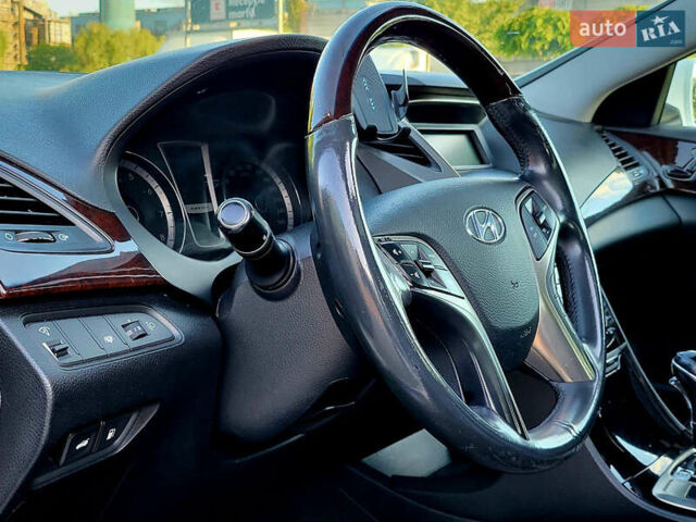 Белый Хендай Азера, объемом двигателя 3 л и пробегом 167 тыс. км за 9900 $, фото 22 на Automoto.ua