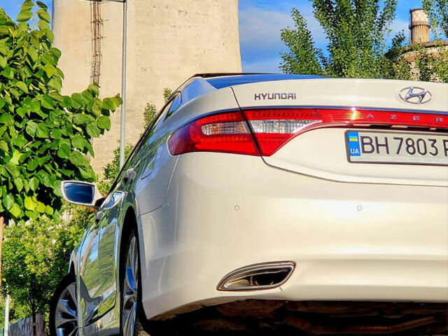 Белый Хендай Азера, объемом двигателя 3 л и пробегом 167 тыс. км за 9900 $, фото 9 на Automoto.ua