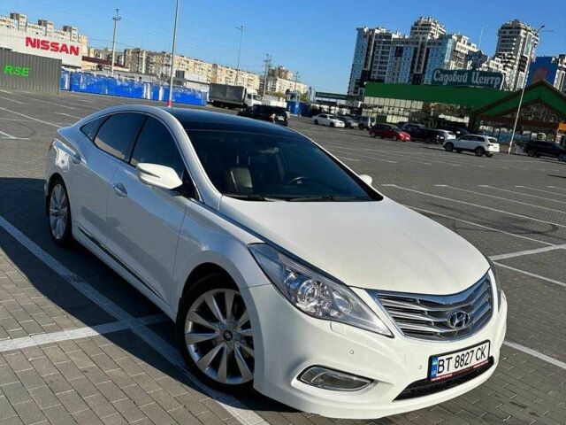 Белый Хендай Азера, объемом двигателя 3 л и пробегом 120 тыс. км за 10500 $, фото 1 на Automoto.ua