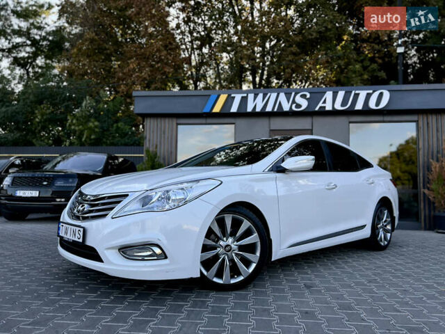 Белый Хендай Азера, объемом двигателя 3 л и пробегом 153 тыс. км за 10900 $, фото 11 на Automoto.ua