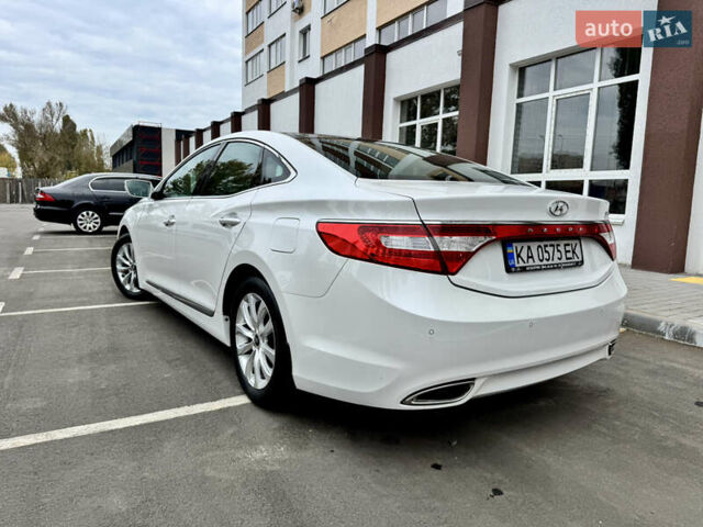 Белый Хендай Азера, объемом двигателя 3 л и пробегом 144 тыс. км за 11800 $, фото 15 на Automoto.ua