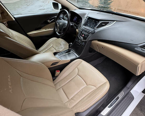 Білий Хендай Азера, об'ємом двигуна 3.34 л та пробігом 178 тис. км за 10800 $, фото 46 на Automoto.ua