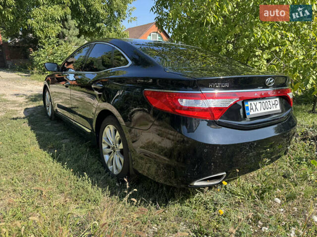 Черный Хендай Азера, объемом двигателя 3 л и пробегом 181 тыс. км за 12200 $, фото 7 на Automoto.ua