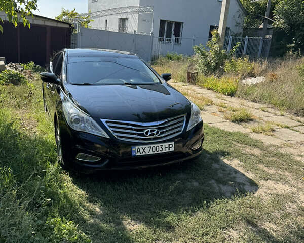Черный Хендай Азера, объемом двигателя 3 л и пробегом 181 тыс. км за 12200 $, фото 1 на Automoto.ua