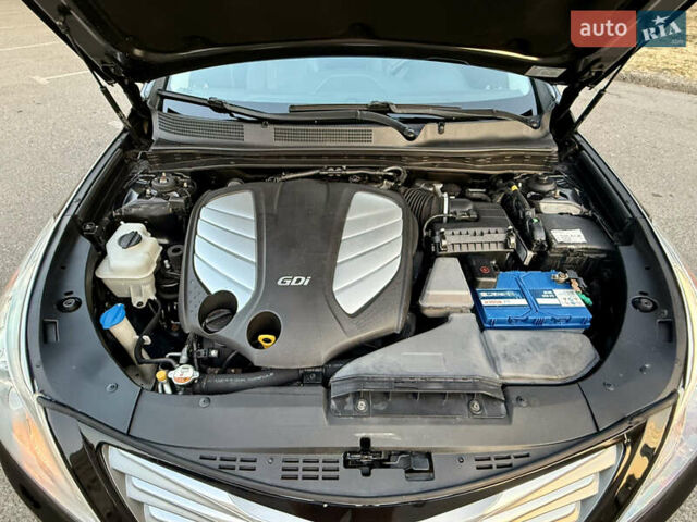 Черный Хендай Азера, объемом двигателя 3.3 л и пробегом 189 тыс. км за 9800 $, фото 24 на Automoto.ua