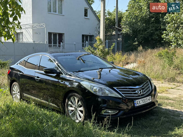 Черный Хендай Азера, объемом двигателя 3 л и пробегом 181 тыс. км за 12200 $, фото 2 на Automoto.ua