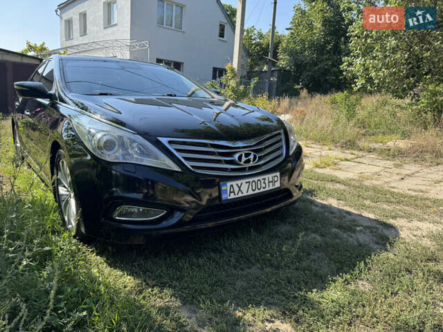 Черный Хендай Азера, объемом двигателя 3 л и пробегом 181 тыс. км за 12200 $, фото 3 на Automoto.ua