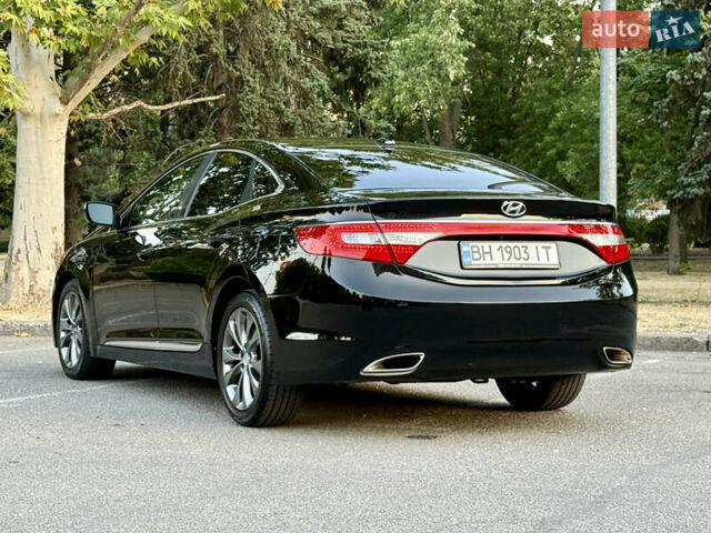 Черный Хендай Азера, объемом двигателя 3.3 л и пробегом 189 тыс. км за 9800 $, фото 6 на Automoto.ua