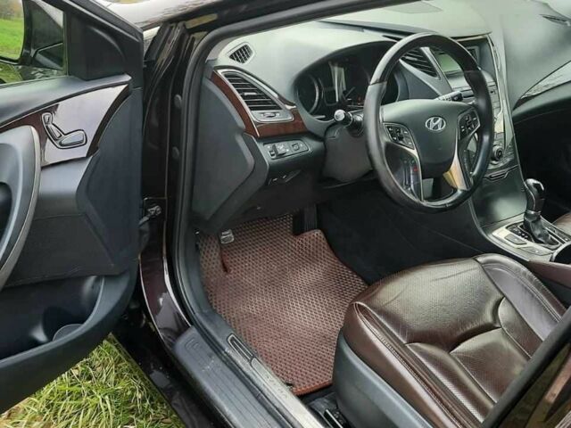 Фиолетовый Хендай Азера, объемом двигателя 3 л и пробегом 180 тыс. км за 10500 $, фото 5 на Automoto.ua