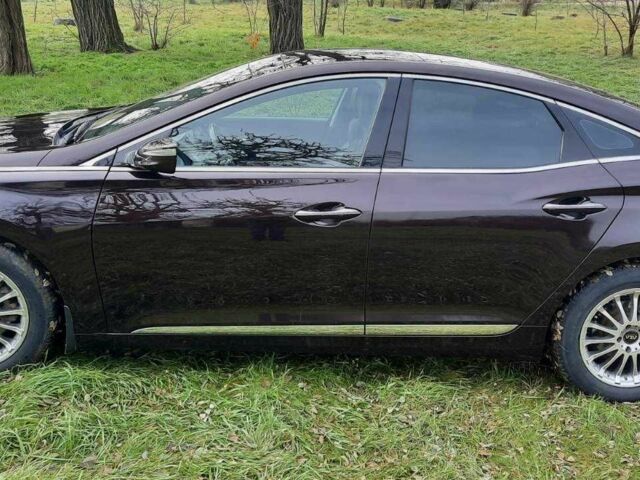Фиолетовый Хендай Азера, объемом двигателя 3 л и пробегом 180 тыс. км за 10500 $, фото 2 на Automoto.ua