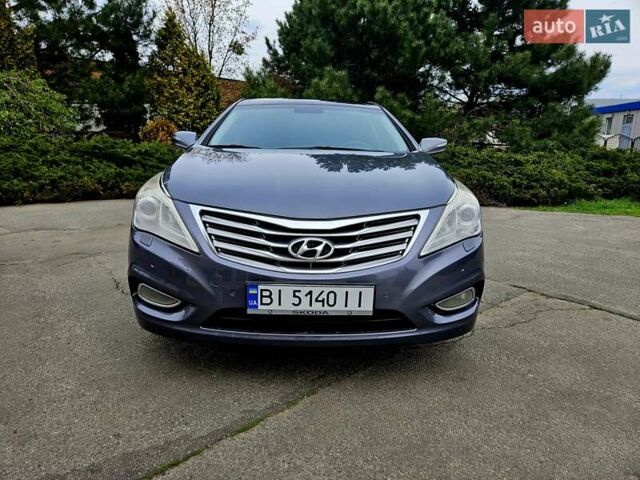 Сірий Хендай Азера, об'ємом двигуна 3 л та пробігом 196 тис. км за 9550 $, фото 4 на Automoto.ua