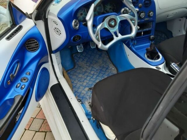 Белый Хендай Купе, объемом двигателя 1.6 л и пробегом 110 тыс. км за 6500 $, фото 3 на Automoto.ua