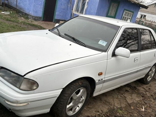 Белый Хендай Купе, объемом двигателя 2 л и пробегом 237 тыс. км за 1000 $, фото 2 на Automoto.ua