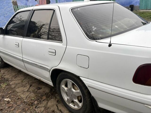 Белый Хендай Купе, объемом двигателя 2 л и пробегом 237 тыс. км за 1000 $, фото 4 на Automoto.ua