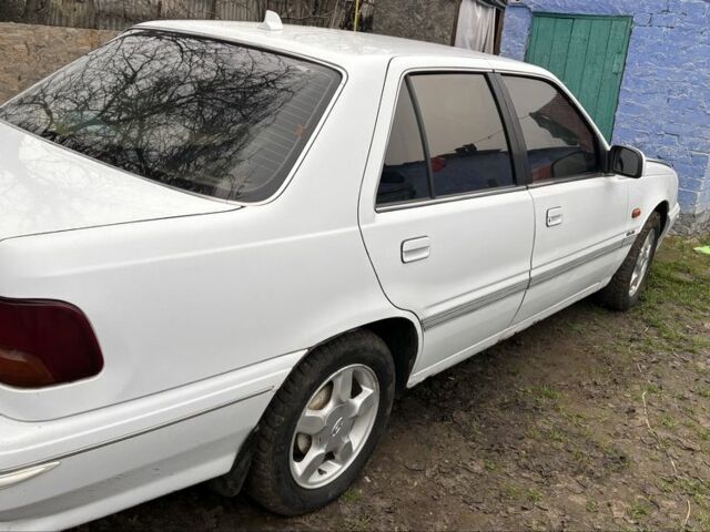 Белый Хендай Купе, объемом двигателя 2 л и пробегом 237 тыс. км за 1000 $, фото 6 на Automoto.ua