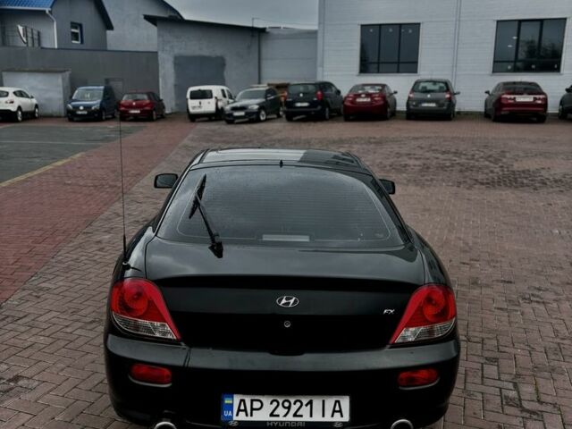 Чорний Хендай Купе, об'ємом двигуна 2 л та пробігом 312 тис. км за 3450 $, фото 5 на Automoto.ua