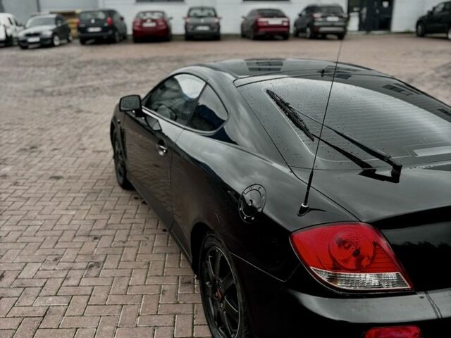 Чорний Хендай Купе, об'ємом двигуна 2 л та пробігом 312 тис. км за 3450 $, фото 4 на Automoto.ua