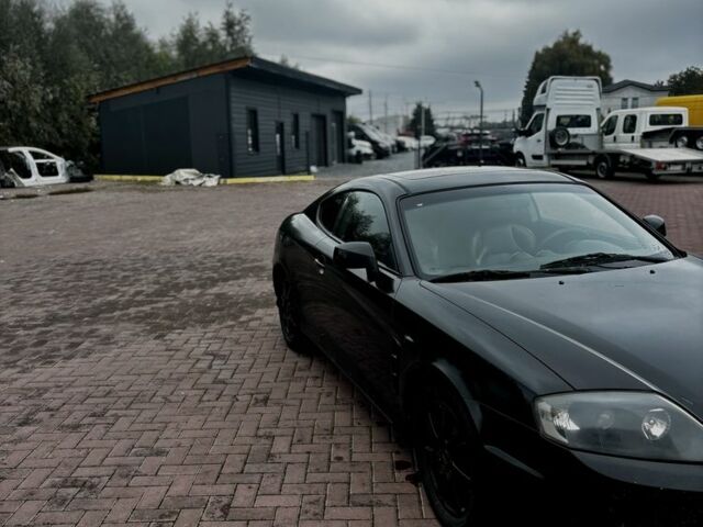 Чорний Хендай Купе, об'ємом двигуна 2 л та пробігом 312 тис. км за 3450 $, фото 2 на Automoto.ua