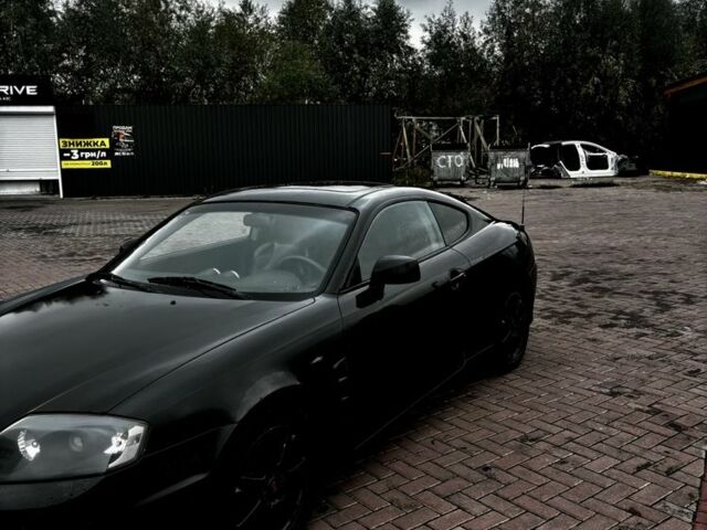 Чорний Хендай Купе, об'ємом двигуна 2 л та пробігом 312 тис. км за 3450 $, фото 1 на Automoto.ua