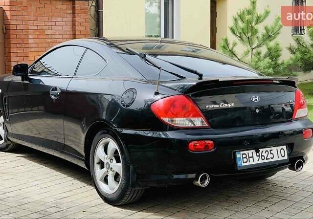 Чорний Хендай Купе, об'ємом двигуна 1.98 л та пробігом 175 тис. км за 4800 $, фото 6 на Automoto.ua