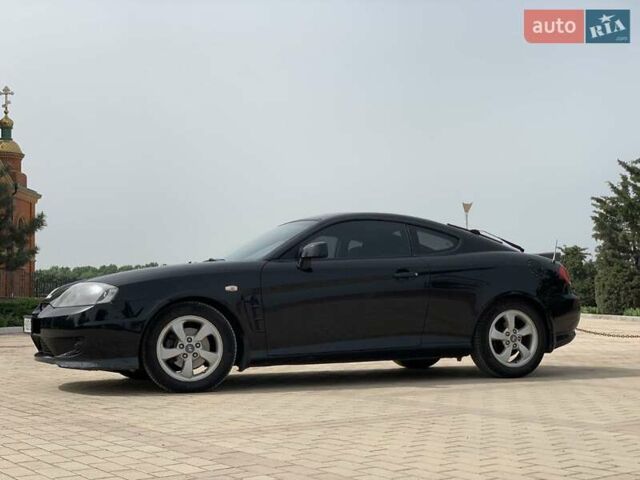 Чорний Хендай Купе, об'ємом двигуна 1.98 л та пробігом 175 тис. км за 4800 $, фото 10 на Automoto.ua