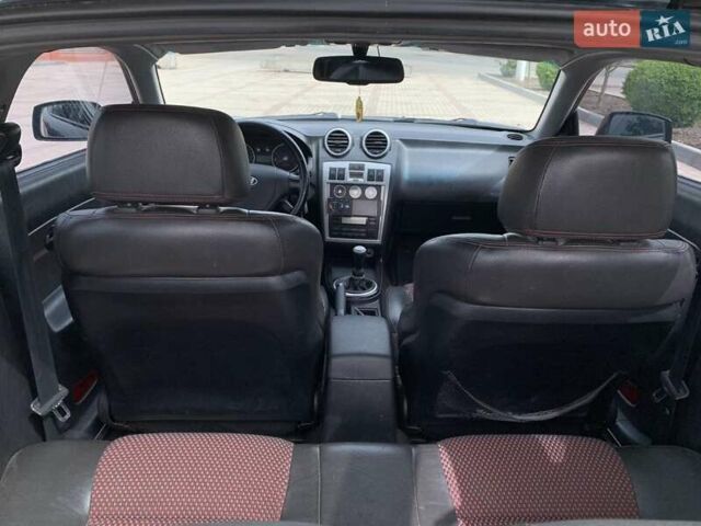 Чорний Хендай Купе, об'ємом двигуна 1.98 л та пробігом 175 тис. км за 4800 $, фото 12 на Automoto.ua