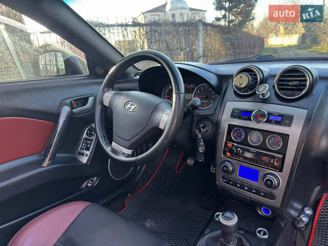 Черный Хендай Купе, объемом двигателя 1.98 л и пробегом 234 тыс. км за 5000 $, фото 15 на Automoto.ua