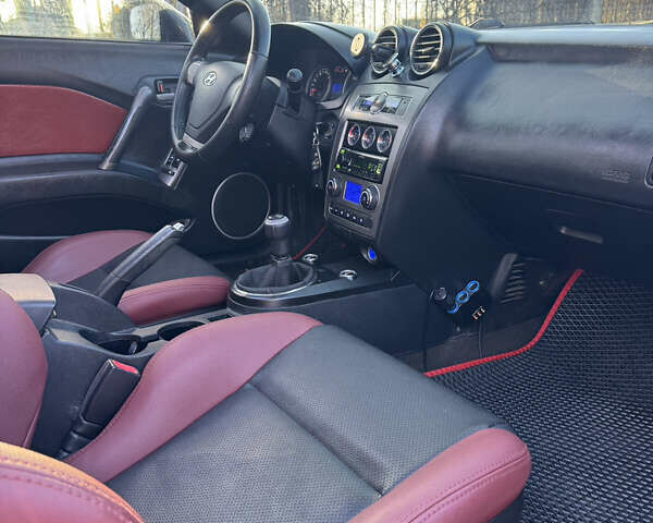 Черный Хендай Купе, объемом двигателя 1.98 л и пробегом 234 тыс. км за 5000 $, фото 12 на Automoto.ua