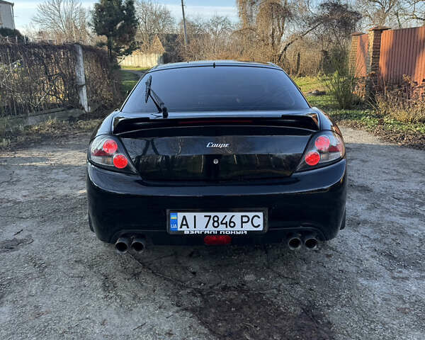 Черный Хендай Купе, объемом двигателя 1.98 л и пробегом 234 тыс. км за 5000 $, фото 4 на Automoto.ua