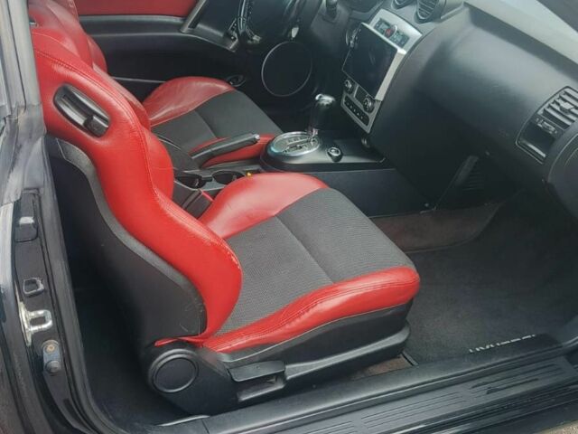 Черный Хендай Купе, объемом двигателя 2 л и пробегом 210 тыс. км за 5800 $, фото 9 на Automoto.ua