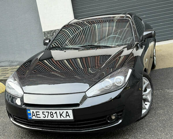 Черный Хендай Купе, объемом двигателя 2.66 л и пробегом 110 тыс. км за 4499 $, фото 1 на Automoto.ua