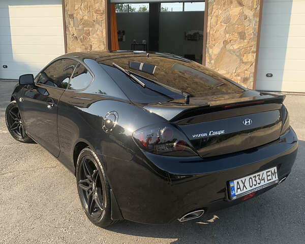 Чорний Хендай Купе, об'ємом двигуна 1.98 л та пробігом 83 тис. км за 8800 $, фото 3 на Automoto.ua