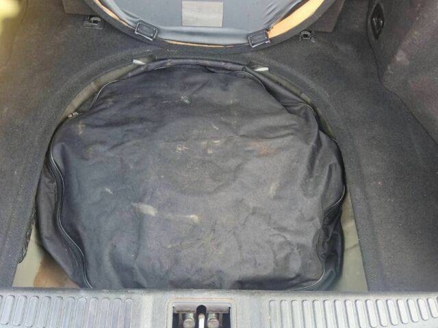 Черный Хендай Купе, объемом двигателя 2 л и пробегом 210 тыс. км за 5800 $, фото 13 на Automoto.ua