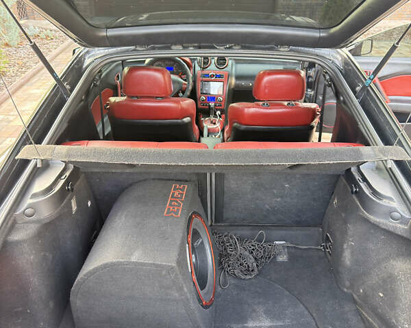 Чорний Хендай Купе, об'ємом двигуна 1.98 л та пробігом 194 тис. км за 6850 $, фото 12 на Automoto.ua