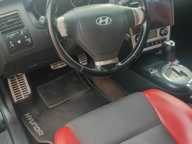 Черный Хендай Купе, объемом двигателя 2 л и пробегом 210 тыс. км за 5800 $, фото 14 на Automoto.ua